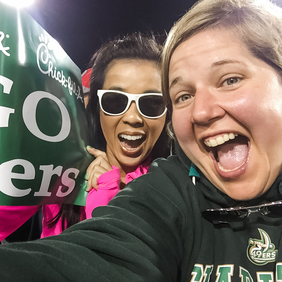 Caroleen and Julie at UNCC UNC Charlotte football game